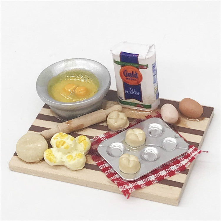 Mini wooden chopping board with toy bread pieces, egg shapes, and blister tray