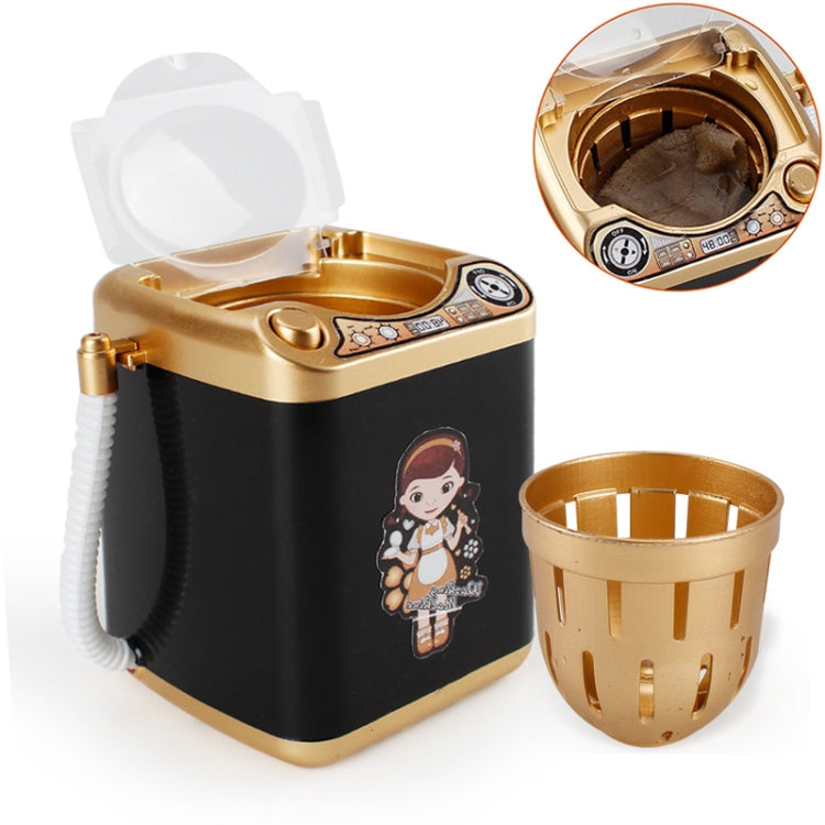 Kids mini toy washing machine in black and gold with open lid and beige basket