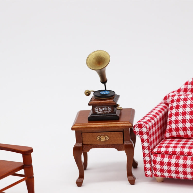 Mini retro gramophone toy with brass horn and wooden cabinet drawer