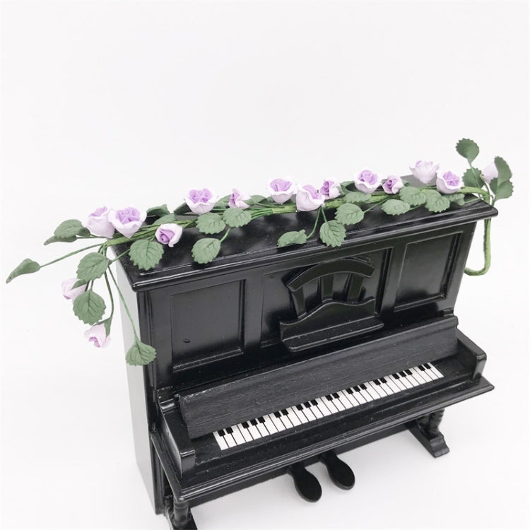 Mini rose string swing: black mini piano with purple rose vine and leaves