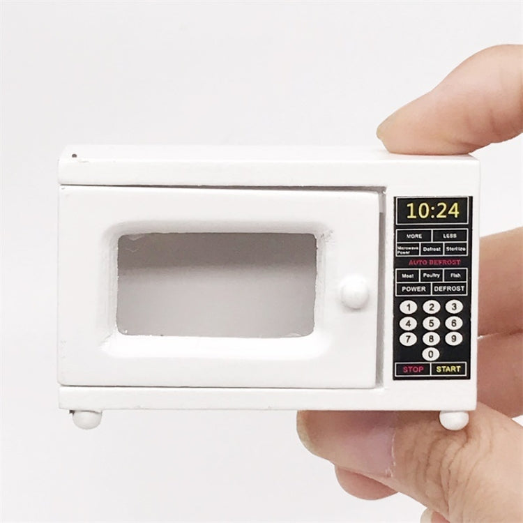 Mini white microwave oven model with digital display and keypad control buttons
