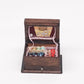 Mini wooden sewing box toy, open front showing buttons, spools, and thread accessories