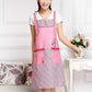 Adult waterproof sleeveless apron in pink with grid patch pockets and floral embroidery