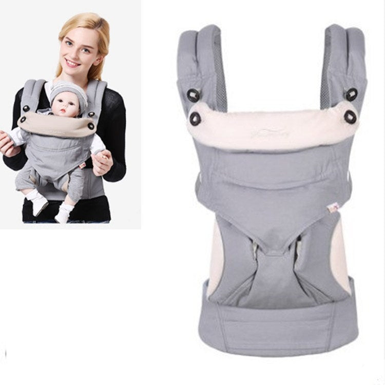 Light gray baby carrier with padded shoulder straps and front wrap-style support