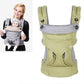 Green baby carrier with padded shoulder straps and front wrap-style pocket panel