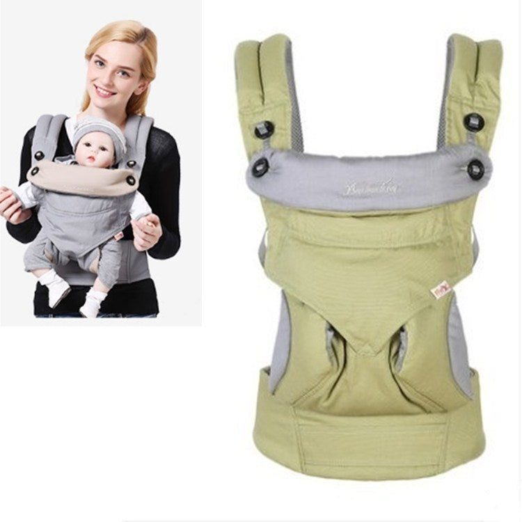Green baby carrier with padded shoulder straps and front wrap-style pocket panel