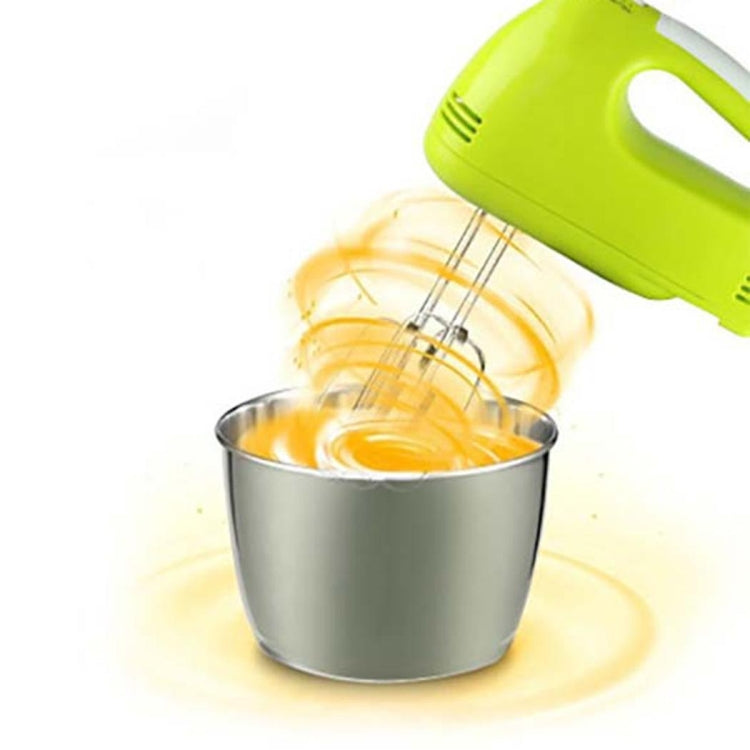 Electric hand mixer with stand, green head mixing batter in stainless bowl