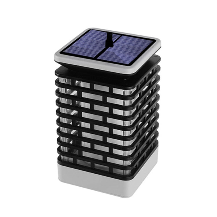 Black solar landscape lantern light with rectangular slatted sides and blue solar panel top
