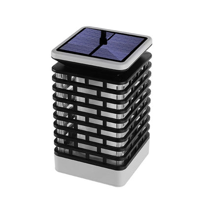 Black solar landscape lantern light with rectangular slatted sides and blue solar panel top