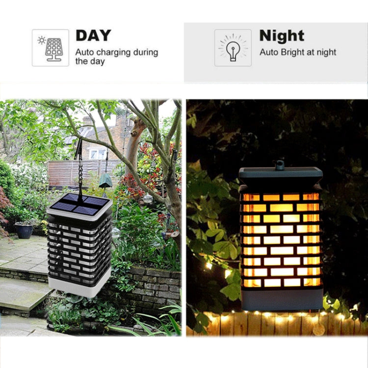 Solar landscape lantern with black grid housing showing bright warm light at night