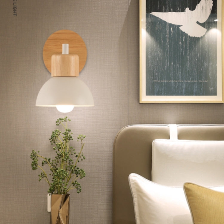 Wall bedside lamp with white fabric shade and wood circular top mount