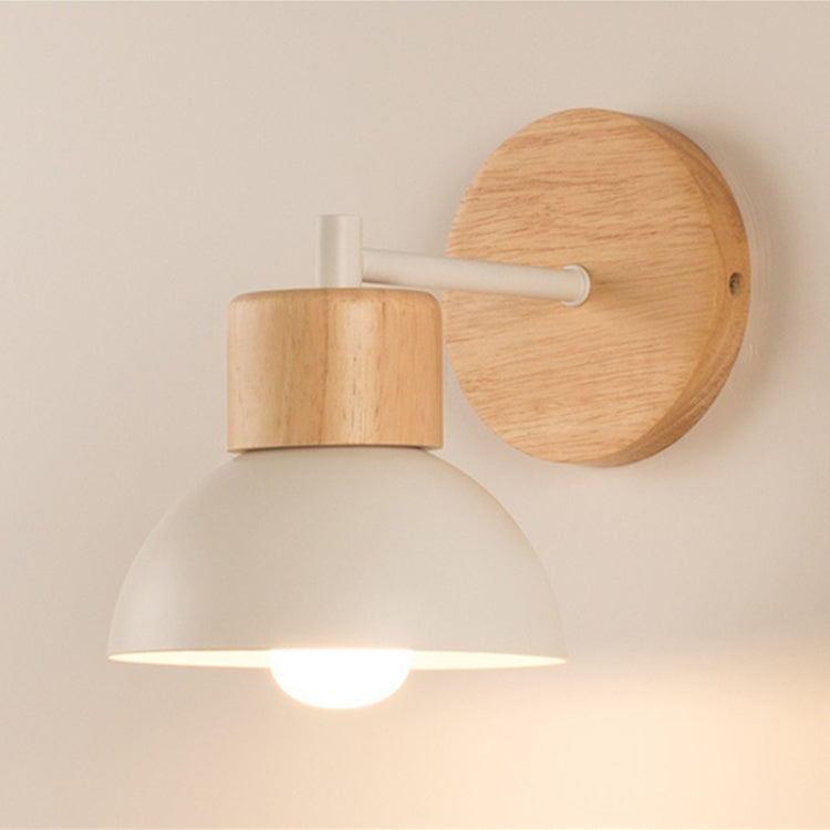 LED wall lamp with white arm, light-wood backplate, and bright white dome shade