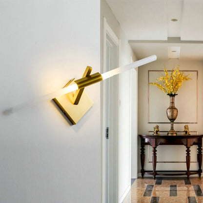 Double-headed wall lamp with gold and black arms and a white LED light bar.