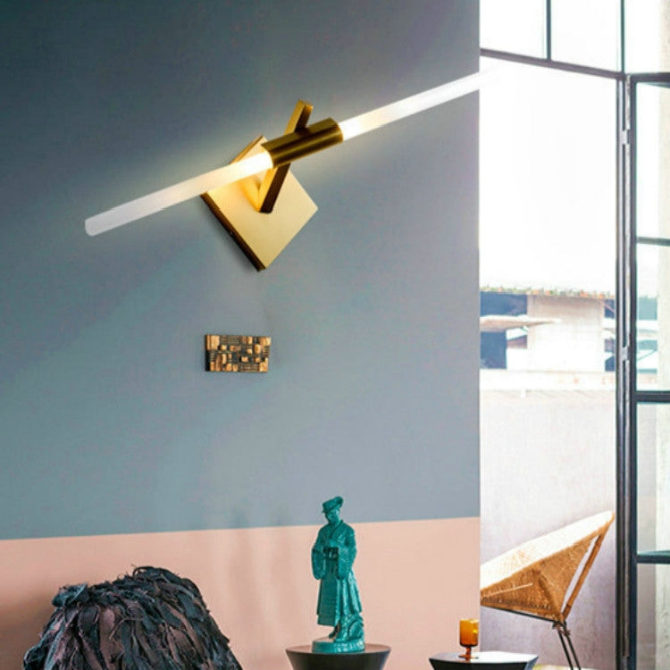 Double-headed wall lamp with gold plate, black center arm, and white LED light bar.