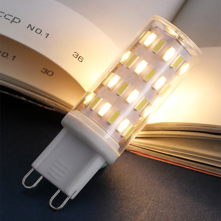 Lit LED G9 light bulb with clear lens and two-pin base