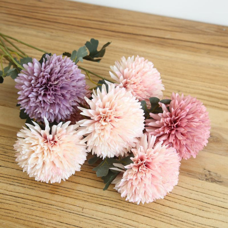 Simulated dandelion flower stems with mixed pastel ball blooms and green leaves