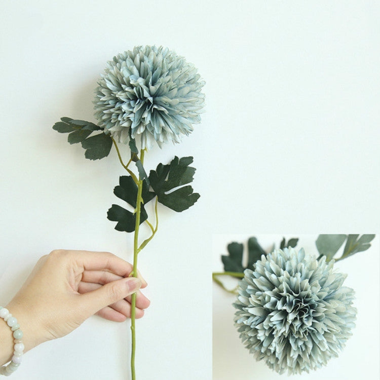 Simulated dandelion flower stem with light blue ball bloom and green leaves