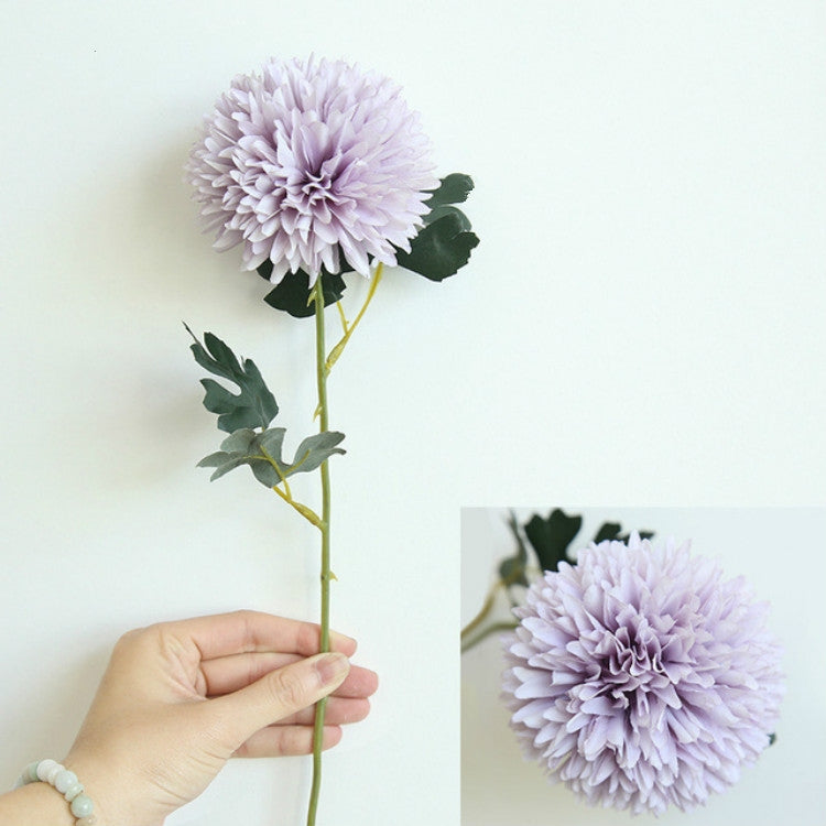 Simulated dandelion flower stem with light purple ball bloom and green leaves