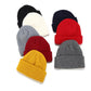 Set of ribbed knit beanies in black, white, navy, red, gray, and yellow