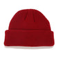 Red ribbed knit beanie with folded cuff and small top knot detail