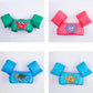 Pink inflatable swimming arm sleeves with cartoon sea animal face and bubble accents