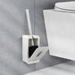 Grey and white wall-mounted toilet brush holder with long chrome handle and lid tray