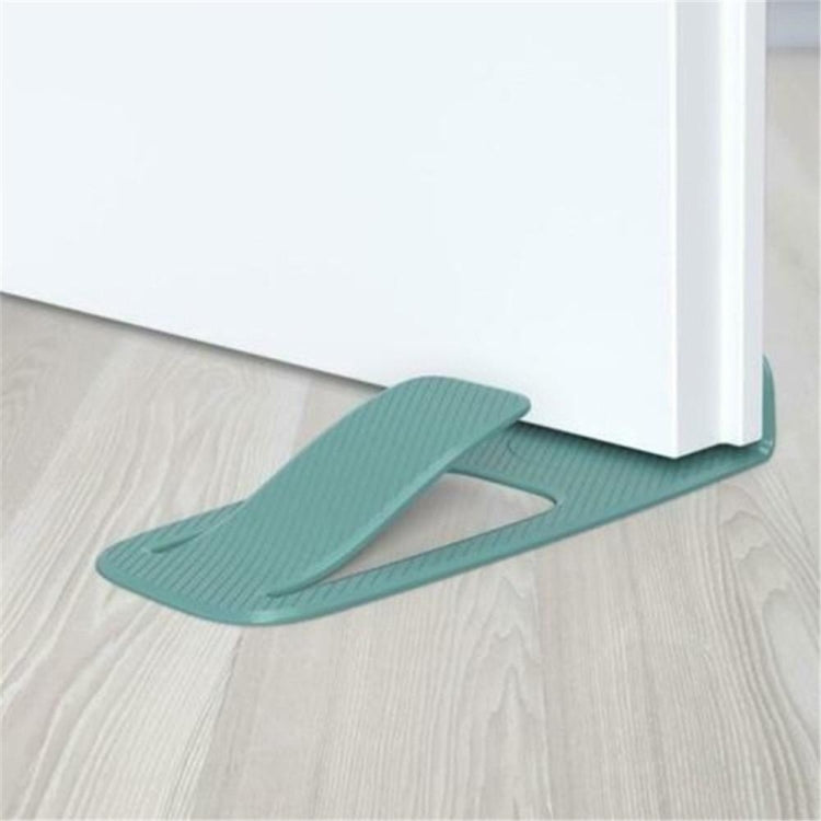 Teal spring door stopper wedge for holding a door open