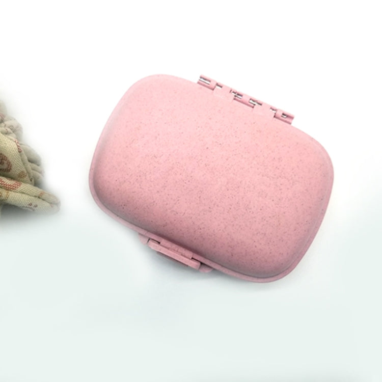 Pink oval mini straw pill storage box with hinged lid and secure clasp