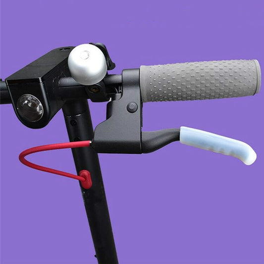 Pair of grey silicone brake protective covers on a scooter handlebar area