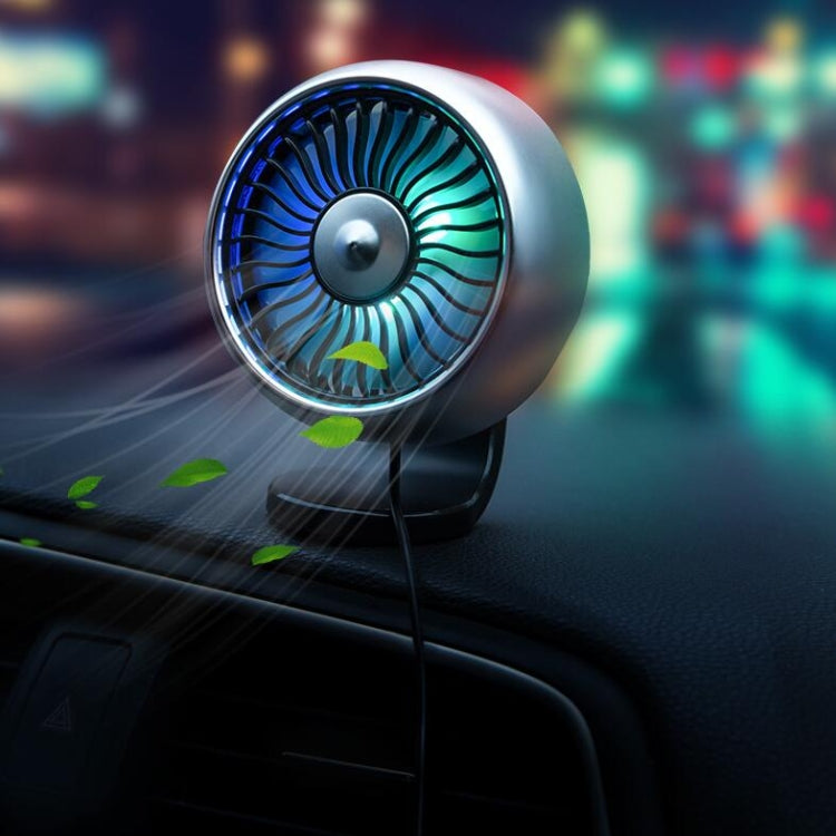 Silver car mini USB fan with blue-green LED airflow ring on dashboard