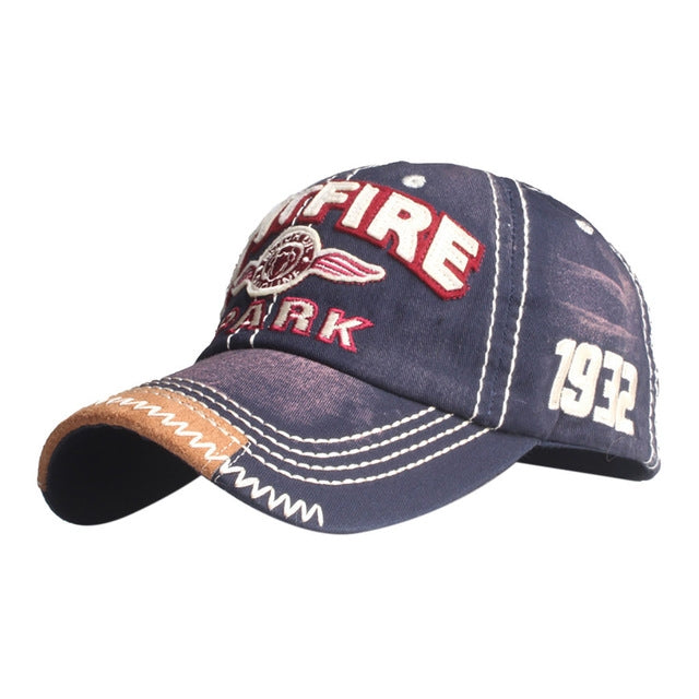 Navy baseball cap with embroidered FIRE patch, ARK text, 1972 number detail, stitched brim