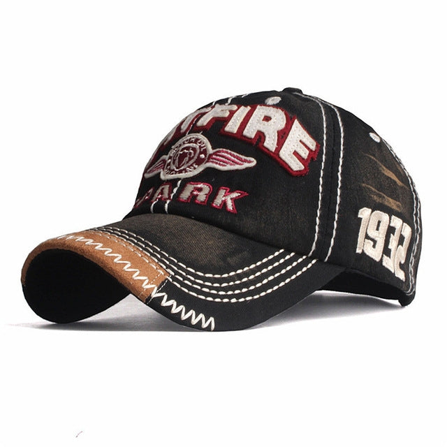 Black baseball cap with embroidered FIRE patch, ARK text, 1972 number panel, stitched brim