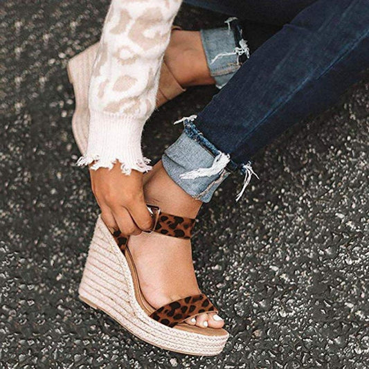 Leopard-print wedge sandals with ankle buckle and rope-textured platform