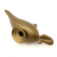 Gold plastic magic lamp prop underside view with round open base and side handle