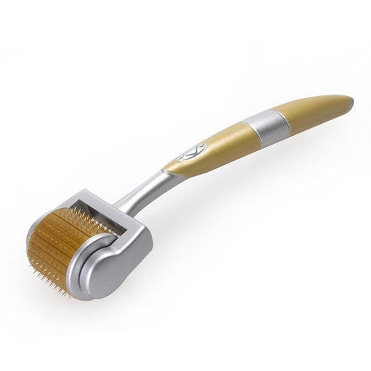 Titanium microneedle roller with gold needle drum in close-up angled view