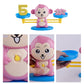 Pink monkey balance scale toy with number tiles, close-up character and platforms