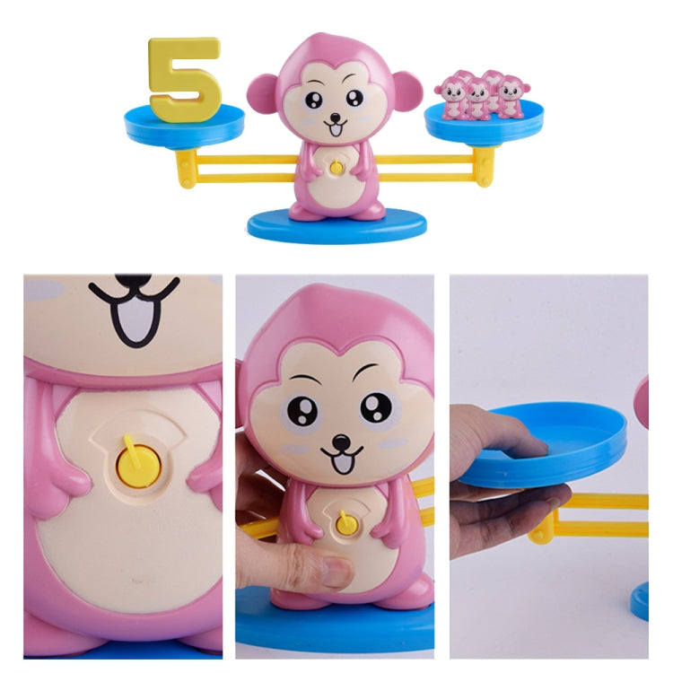 Pink monkey balance scale toy with number tiles, close-up character and platforms