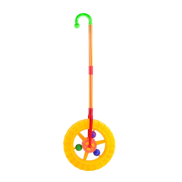 Plastic push toy walker with one yellow spinning wheel and orange/yellow handle