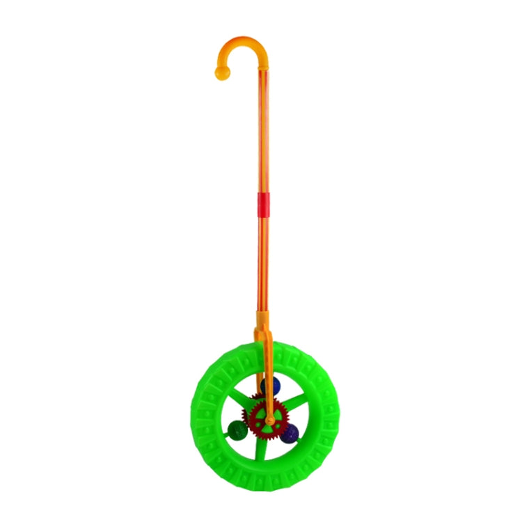 Plastic push toy walker with one green spinning wheel and orange/yellow handle