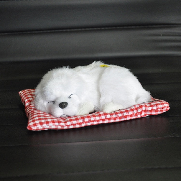 Plush sleeping dog ornament toy, white fur, in red plaid bed