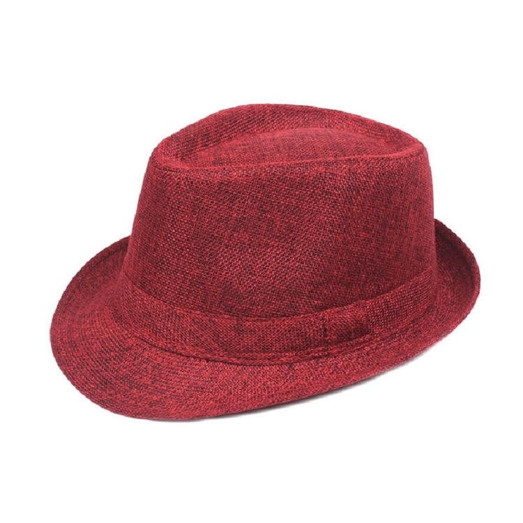 Red woven sun visor hat with short brim and stitched band detail.
