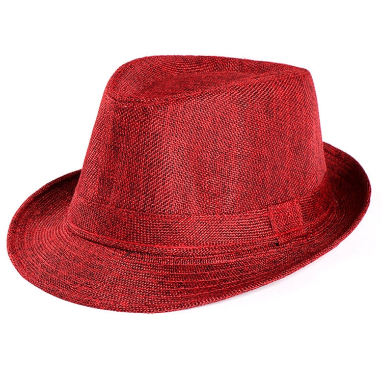 Red textured sun hat with shallow crown and short brim, side view.