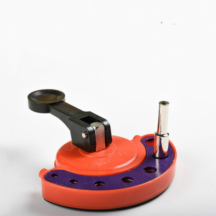 Orange suction glass hole cutter base with drill bit guide and black handle