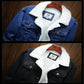 Blue and black denim jackets with white sherpa lining, button front and chest pockets