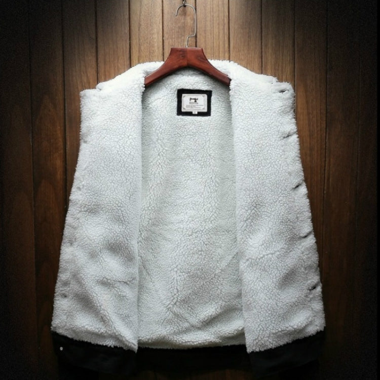 White sherpa-lined front with small label on denim jacket, no sleeves shown