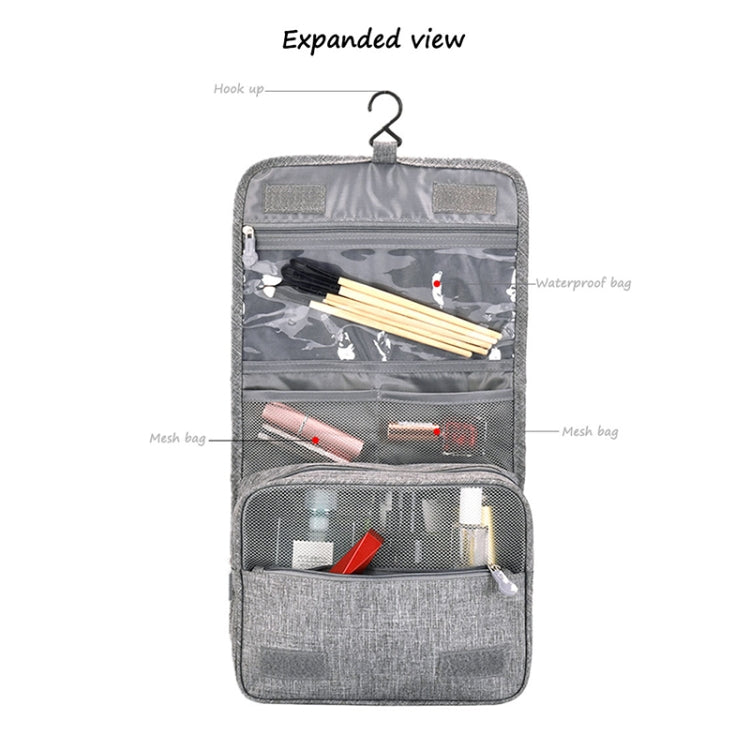 Grey hanging travel organizer bag with hook, mesh sleeves, and zip front compartments