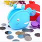Blue fish silicone coin purse on coins, with cartoon face and side fin