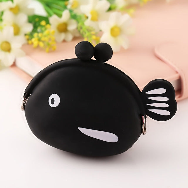 Black fish-shaped silicone coin purse with cartoon face and curved zipper