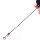Retractable key chain clip with extended black cord and metal spring clasp