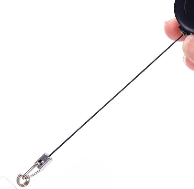 Retractable key chain clip with extended black cord and metal spring clasp